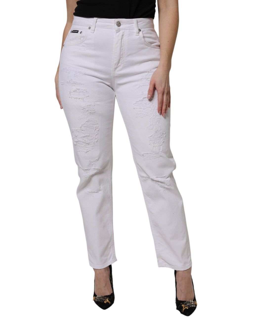 Jeans skinny en coton blanc à taille haute de Dolce & Gabbana, coupe ajustée et détails classiques visibles sur l'image.