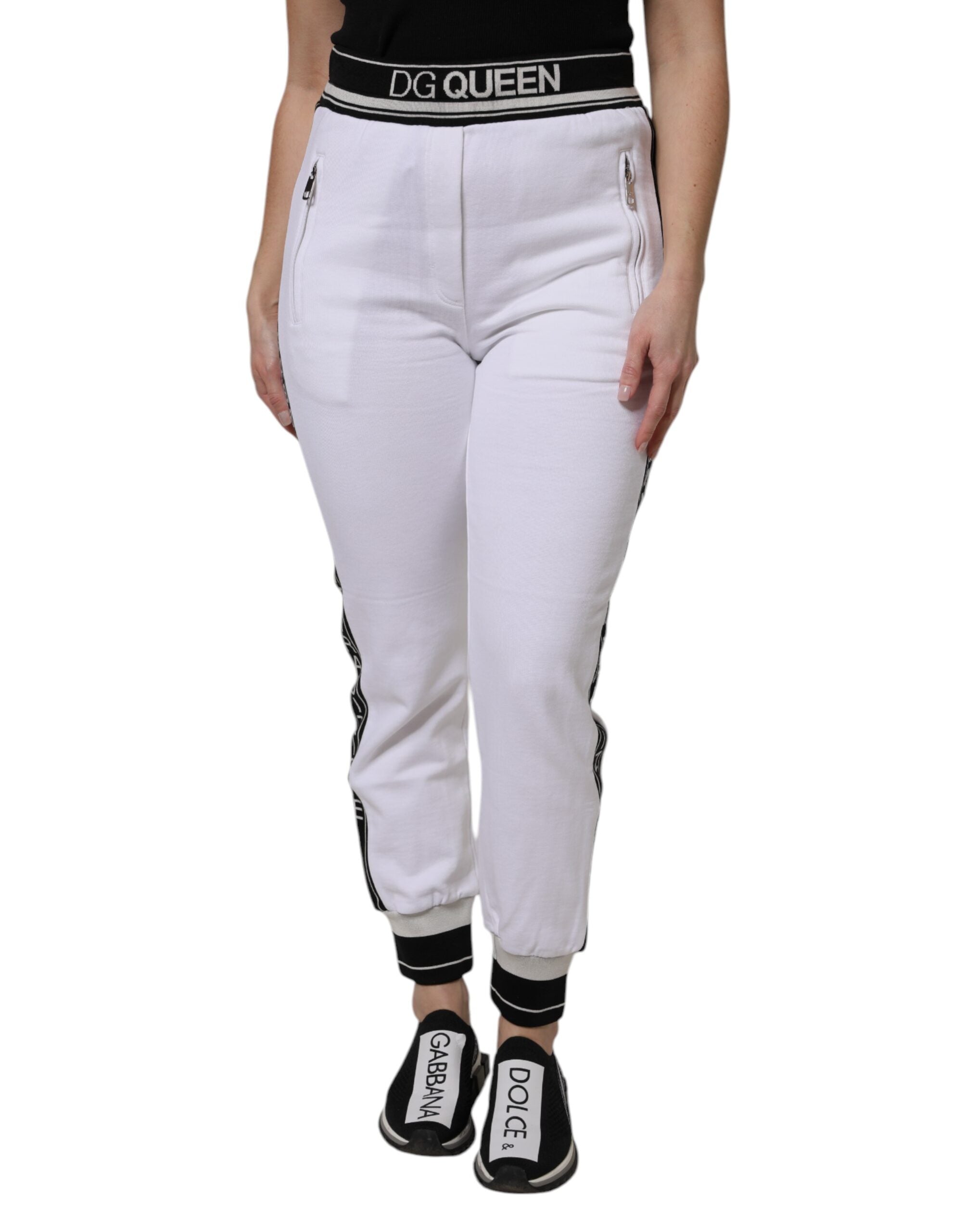 Pantalons joggers Dolce & Gabbana en coton blanc stretch, avec ceinture élastique et poches latérales, vue de face.