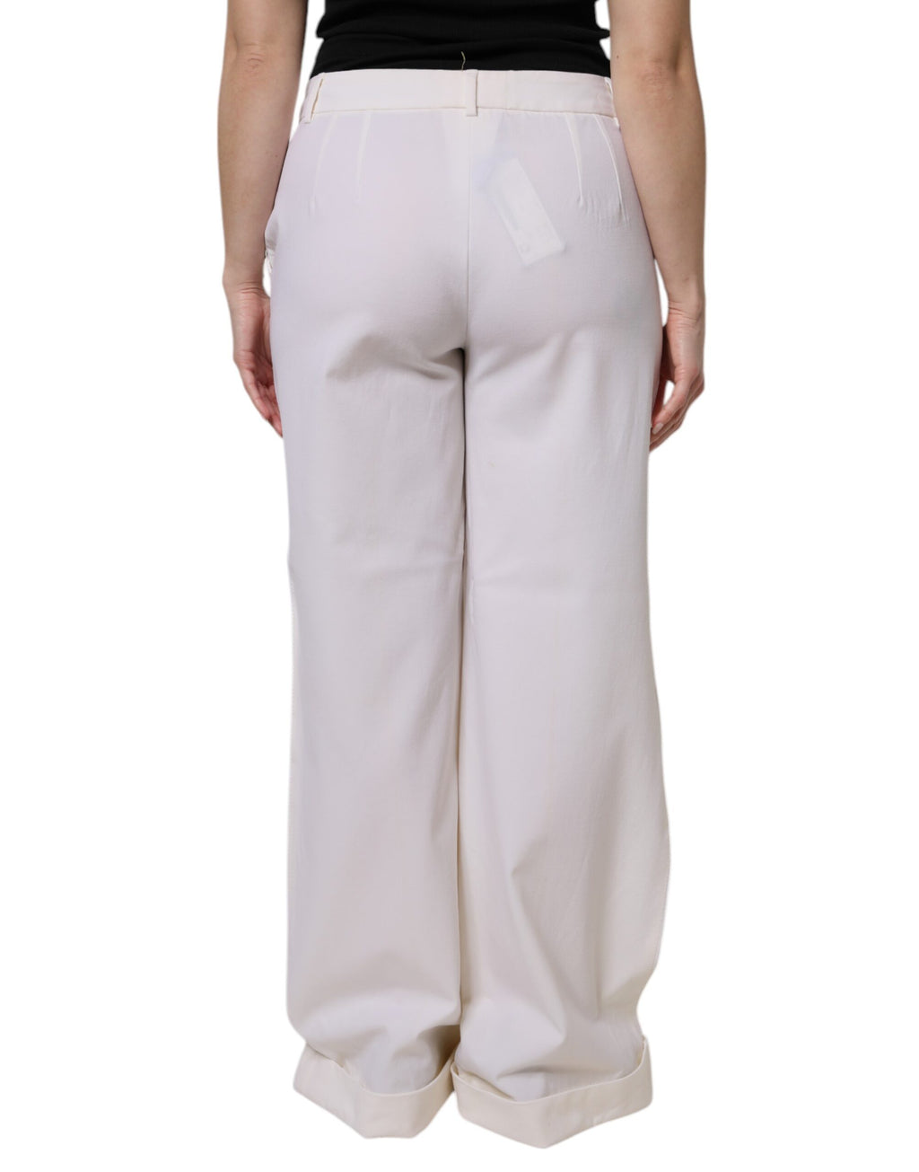 Pantalons en laine blanche Dolce & Gabbana, taille moyenne, coupe large et jambes évasées, mode élégante et sophistiquée.