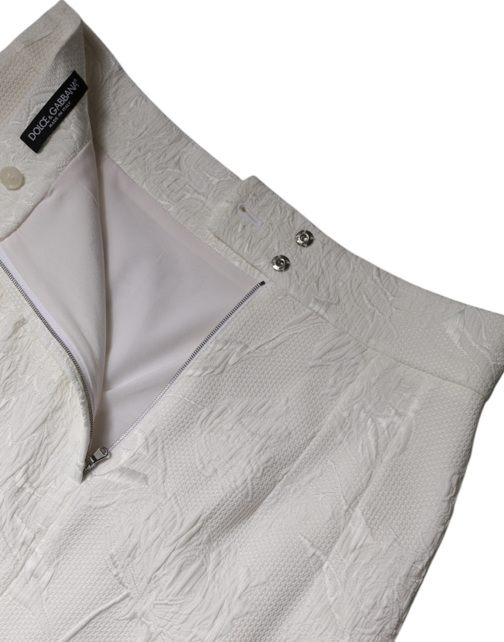 Jupe crayon blanche à taille haute de longueur au genou de Dolce & Gabbana, élégante et chic, en tissu fluide.