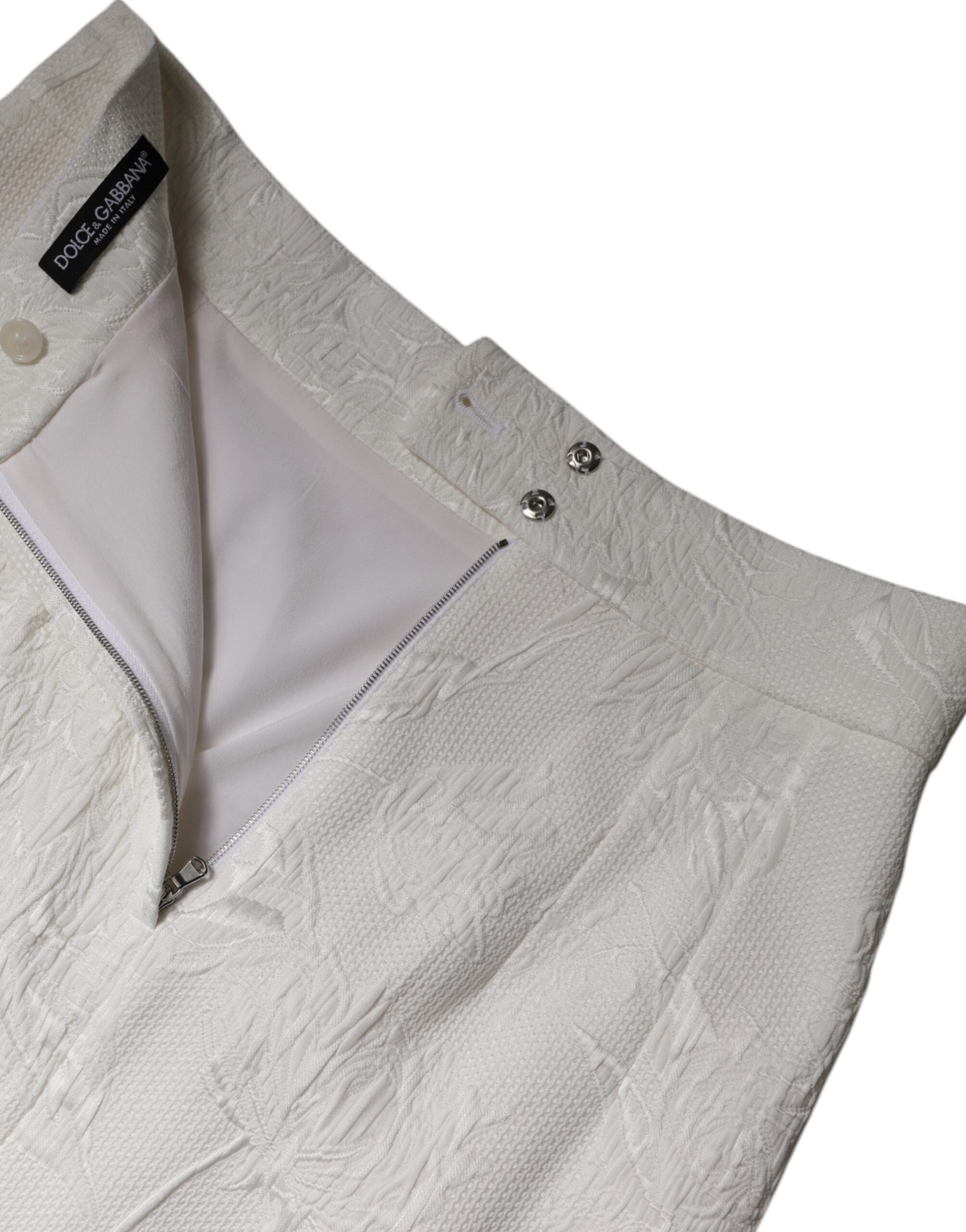 Jupe crayon blanche à taille haute de longueur au genou de Dolce & Gabbana, élégante et chic, en tissu fluide.