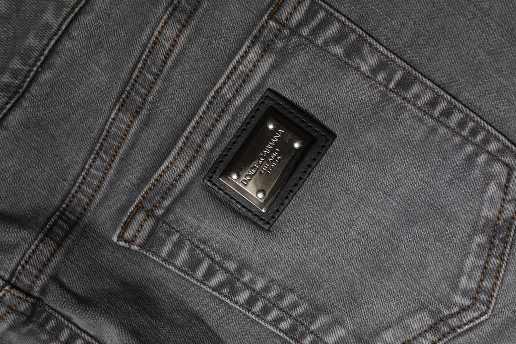 Jupe courte en denim gris Dolce & Gabbana, taille mi-haute, en coton stretch, vue de face.