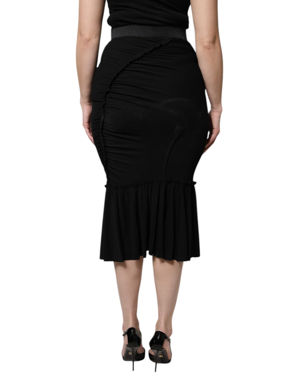 Jupe midi noire en coupe sirène à taille haute de Dolce & Gabbana, élégante et moulante, en tissu fluide.