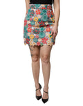Jupe courte à taille haute Dolce & Gabbana à motifs floraux multicolores en dentelle, élégante et féminine.