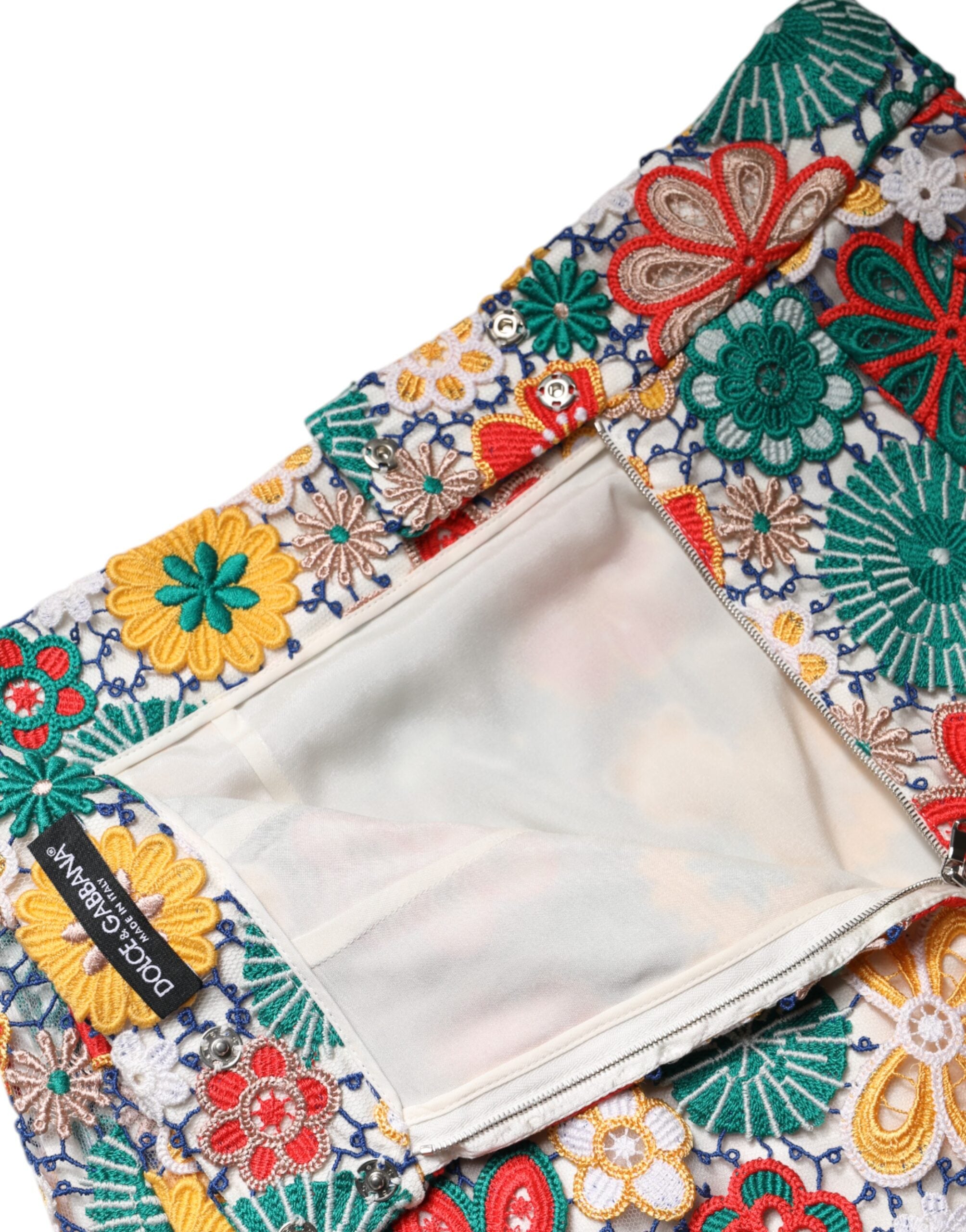 Jupe courte haute en dentelle florale multicolore de Dolce & Gabbana, style féminin avec motif floral élégant.