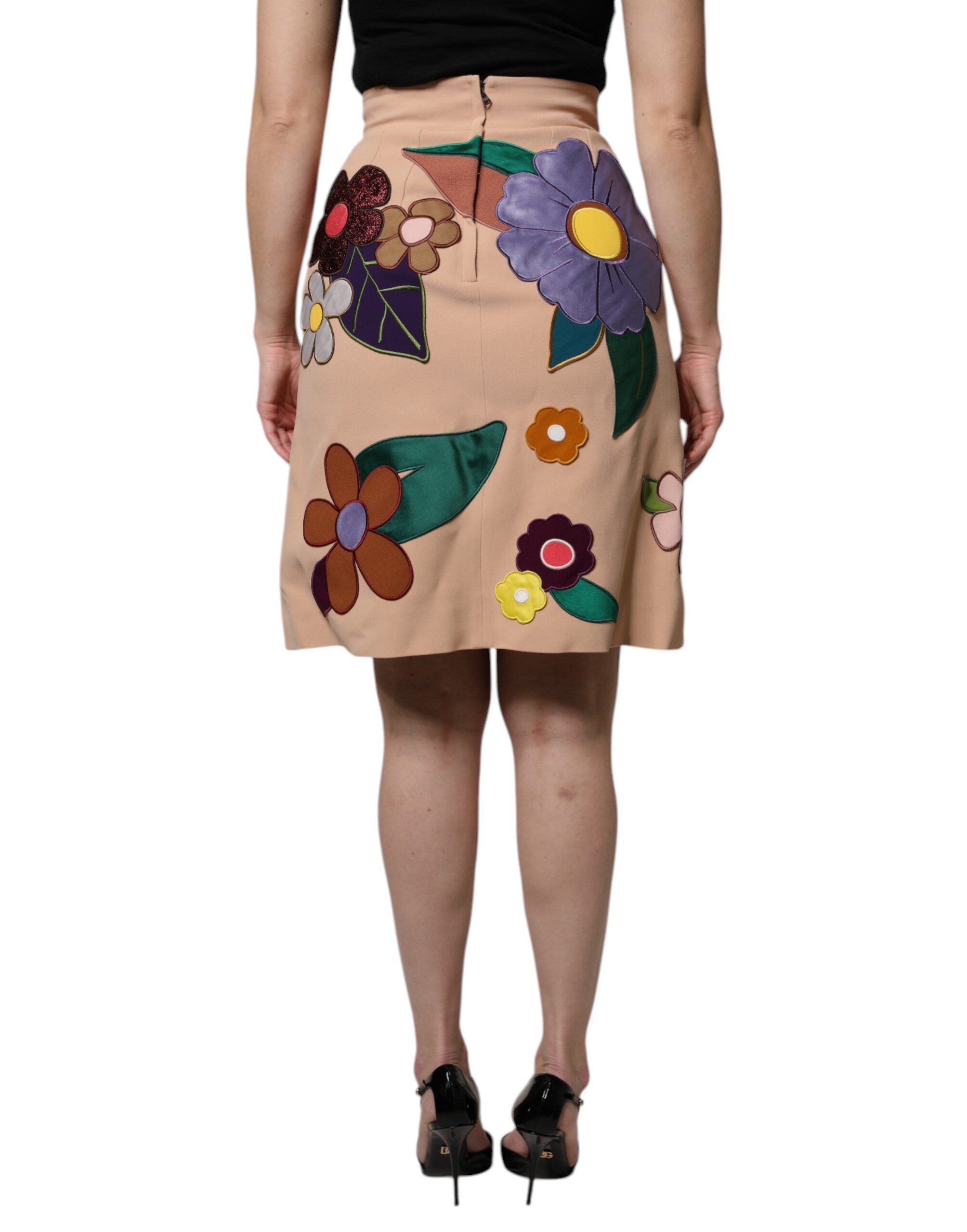 Jupe crayon beige à fleurs Dolce & Gabbana avec taille haute, tissu élégant et coupe ajustée, vue de face.