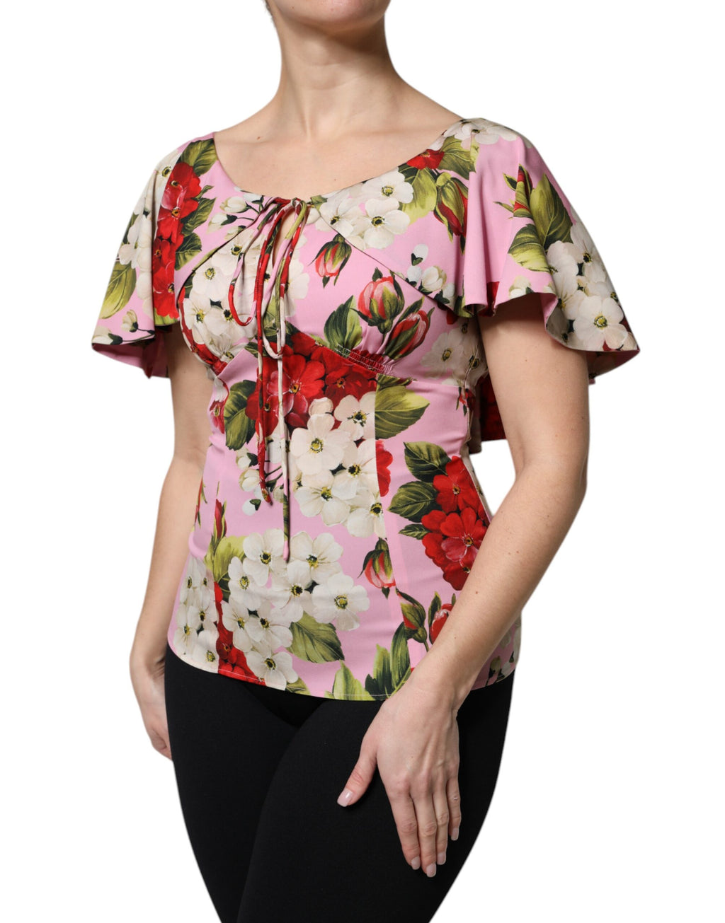 Chemisier en soie rose à fleurs Dolce & Gabbana avec manches courtes, élégant et léger, parfait pour un look sophistiqué.