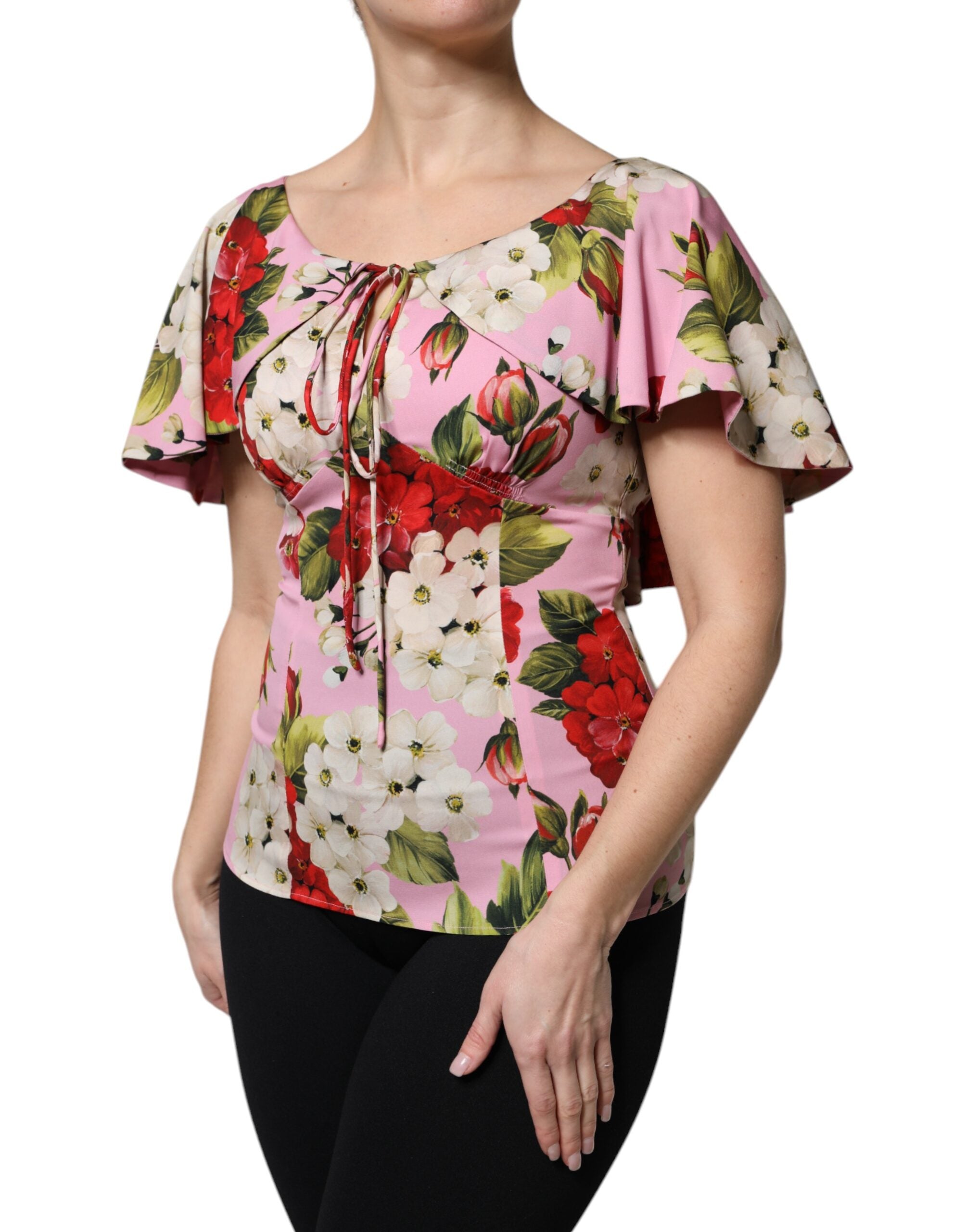 Chemisier en soie rose à fleurs Dolce & Gabbana avec manches courtes, élégant et léger, parfait pour un look sophistiqué.