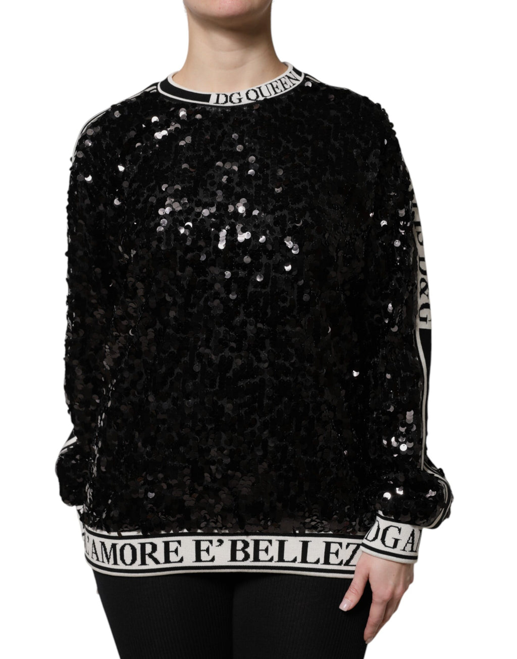 Pull en maille Dolce & Gabbana noir à sequins DG Queen, doux et élégant, avec détails brillants visibles sur l'image.