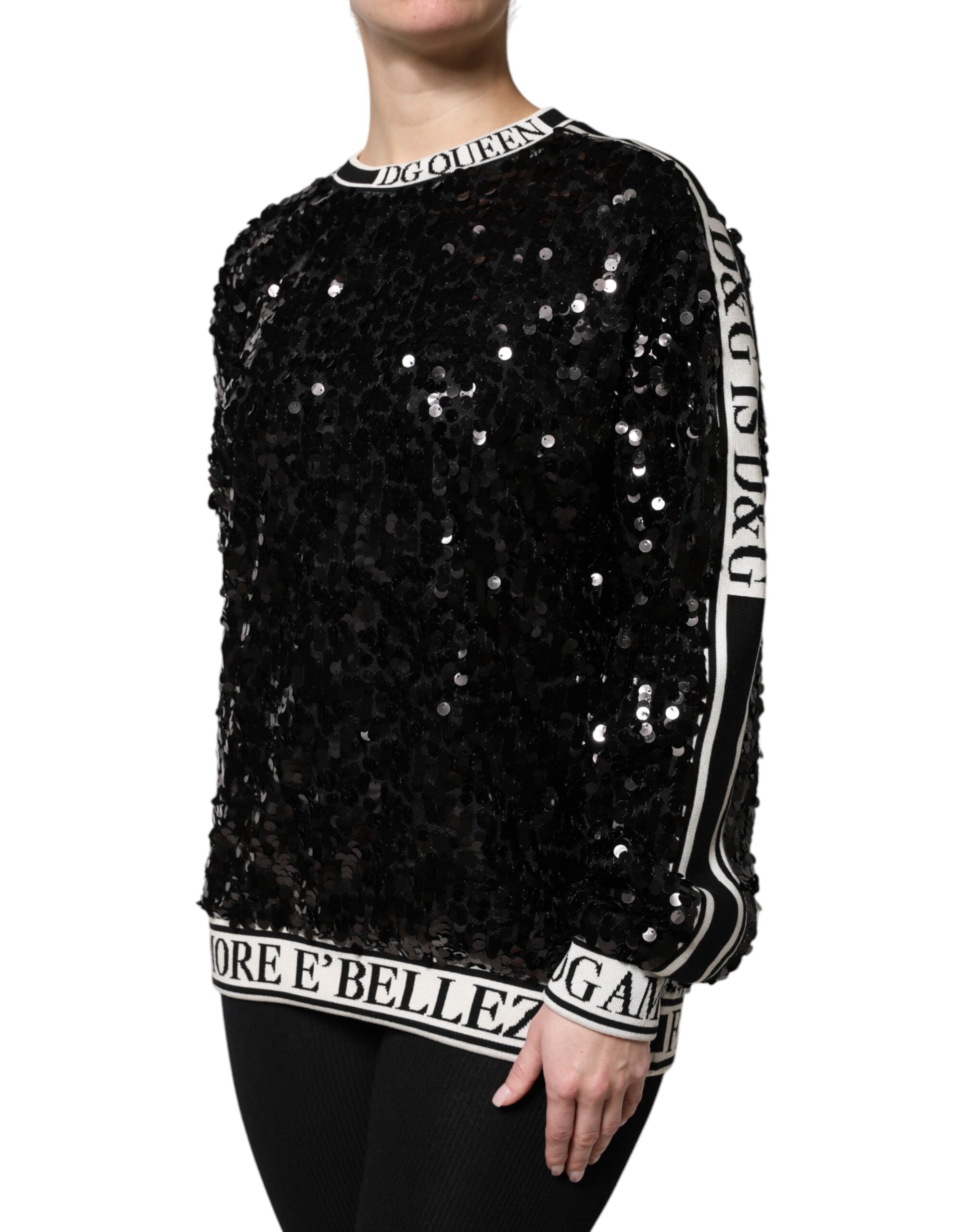 Pull noir Dolce & Gabbana DG Queen avec sequins, pull-over élégant avec détails scintillants, vue de face sur fond neutre.