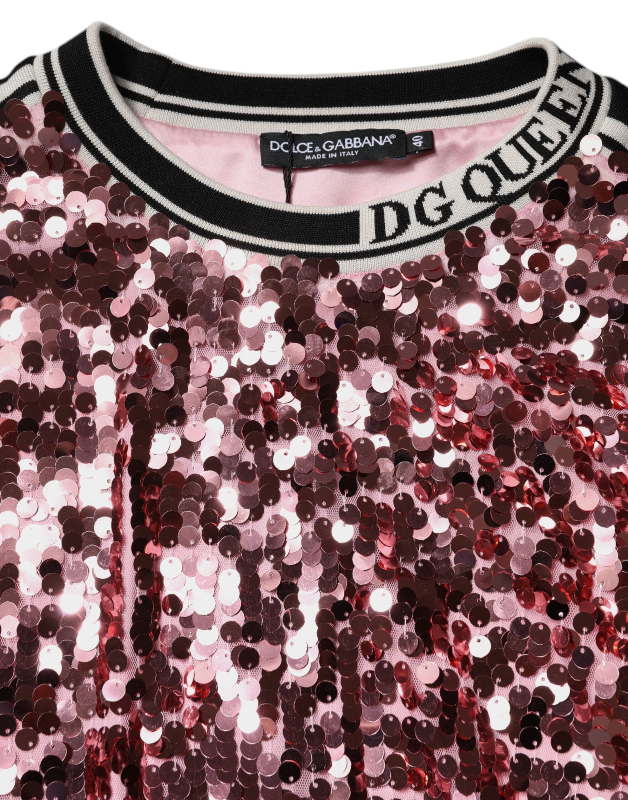 Pull Dolce & Gabbana rose à sequins DG Queen, pull-over rose avec détails brillants, pour un style élégant et glamour.