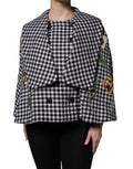 Cape blazer Dolce & Gabbana à motif floral monochrome noir et blanc, style élégant et sophistiqué.