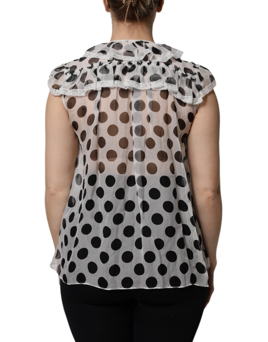 Haut sans manches en coton blanc et noir à pois de Dolce & Gabbana, style élégant et léger.