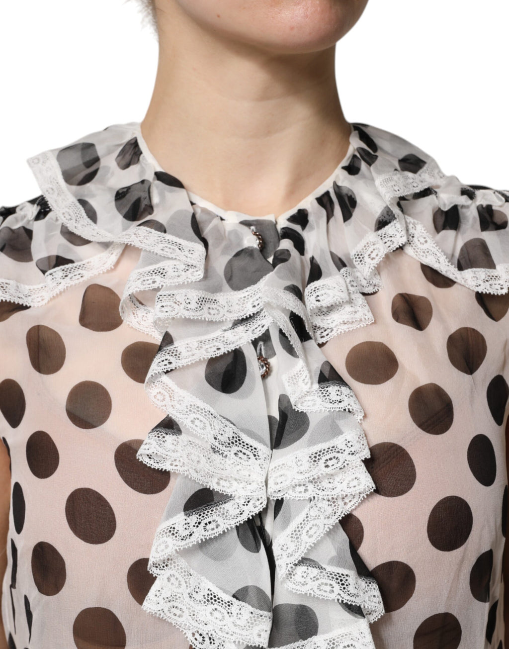 Haut sans manches en coton blanc et noir à pois de Dolce & Gabbana, style élégant et tendance.