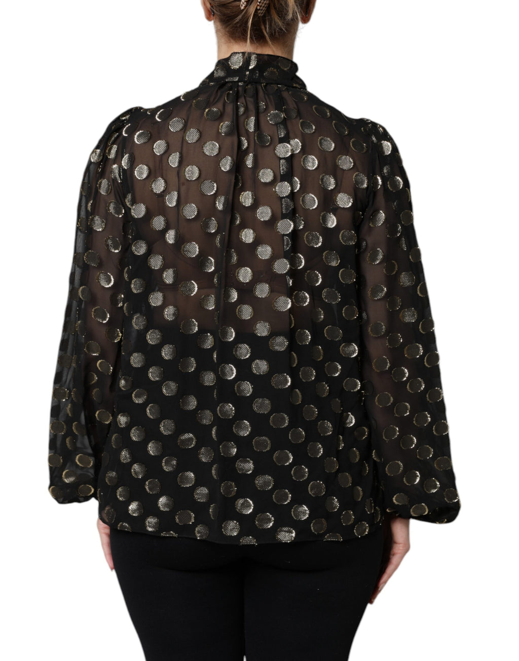 Blouse noire transparente à pois avec nœud au cou de Dolce & Gabbana, tissu léger et élégant, manches longues et style chic.