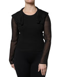 Blouse en soie noire Dolce & Gabbana à manches longues transparentes, élégante et légère, vue de face.