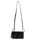 Sac à bandoulière en cuir noir Dolce & Gabbana avec logo, élégant et sophistiqué, visible en détail.