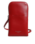 Sangle de téléphone en cuir rouge Dolce & Gabbana, sac à bandoulière croisé, accessoire de mode élégant et tendance.