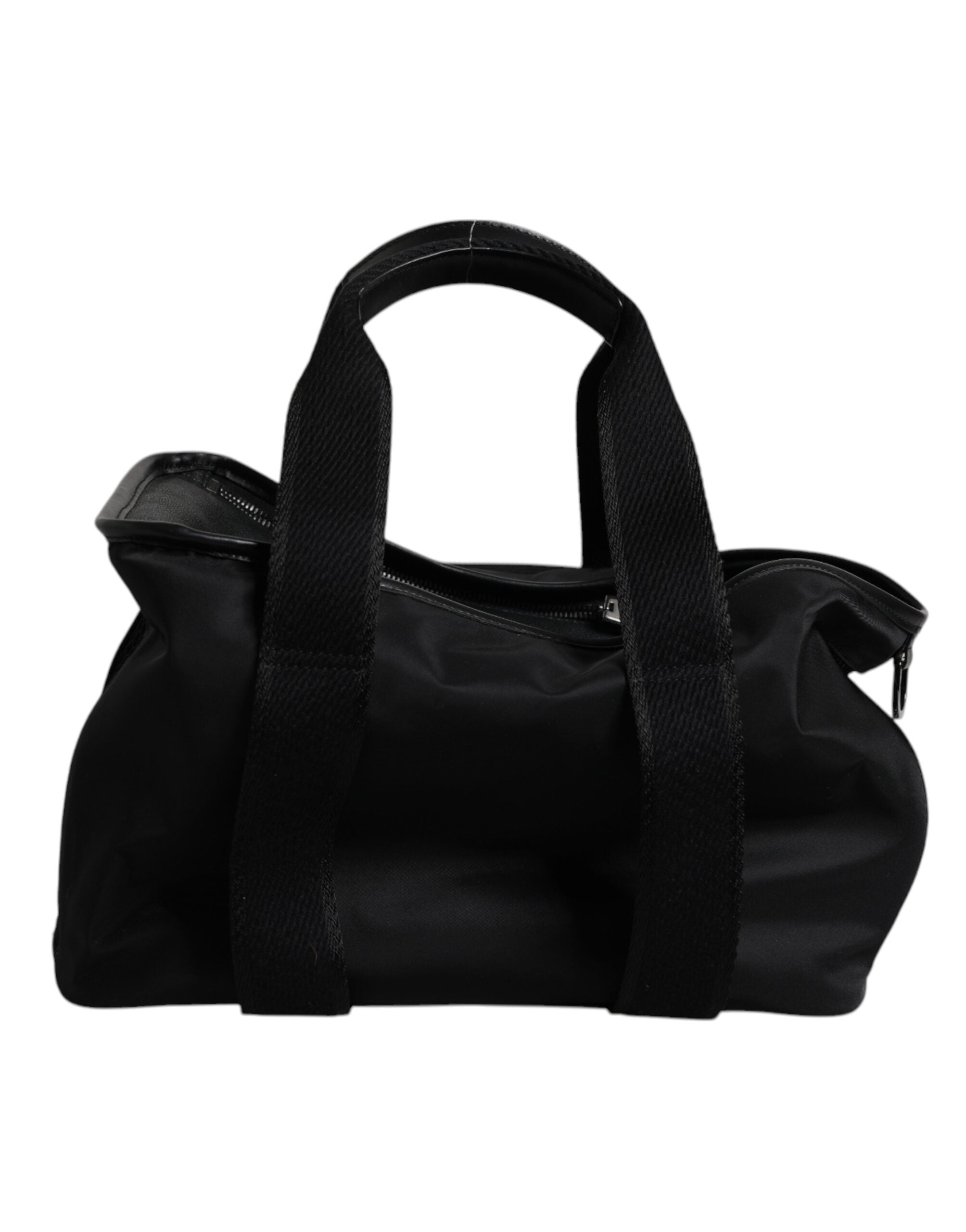 Sac Dolce & Gabbana noir avec bandoulière, logo et plaque décorative, idéal pour transporter un petit animal ou comme accessoire élégant.