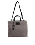 Sac cabas Dolce & Gabbana en laine d'alpaga grise avec logo en plaque, porté sur l'épaule, élégant et spacieux.