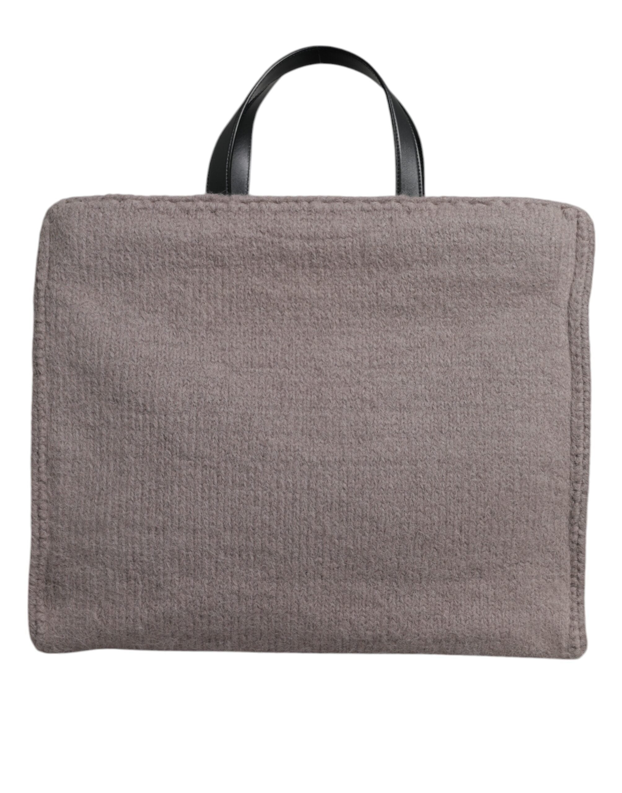 Sac cabas Dolce & Gabbana en laine d'alpaga grise avec logo en plaque, porté sur l'épaule, visible de face.