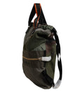Sac à dos Dolce & Gabbana vert militaire avec patchwork, design élégant et robuste, idéal pour un style tendance et pratique.