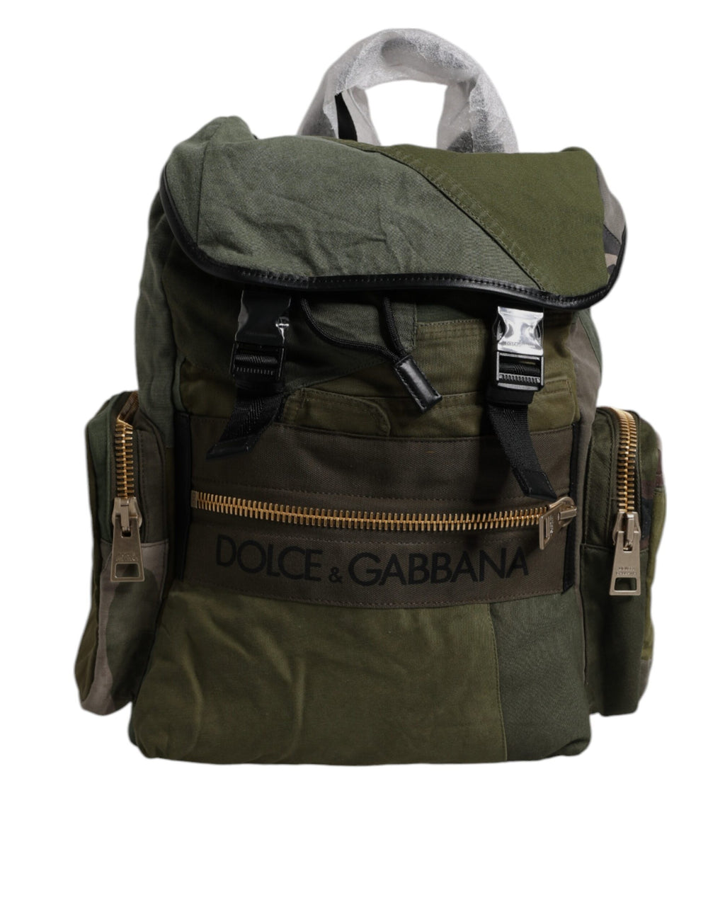 Sac à dos de voyage camouflage vert militaire Dolce & Gabbana avec patchwork, poignée en cuir et compartiments spacieux.