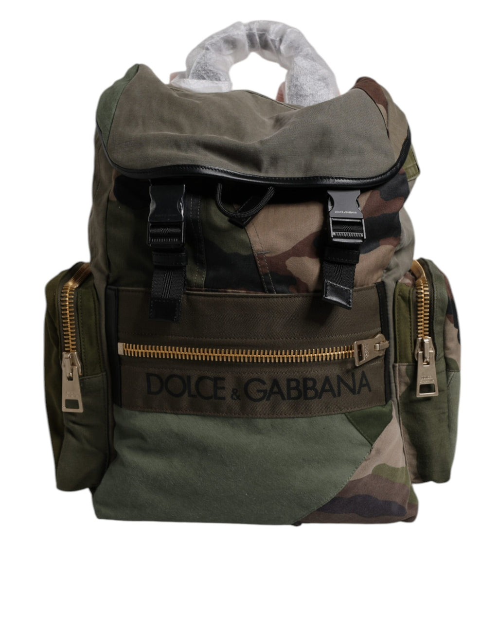 Sac à dos de voyage en patchwork vert militaire Dolce & Gabbana, avec détails en tissu et design robuste visible sur l'image.