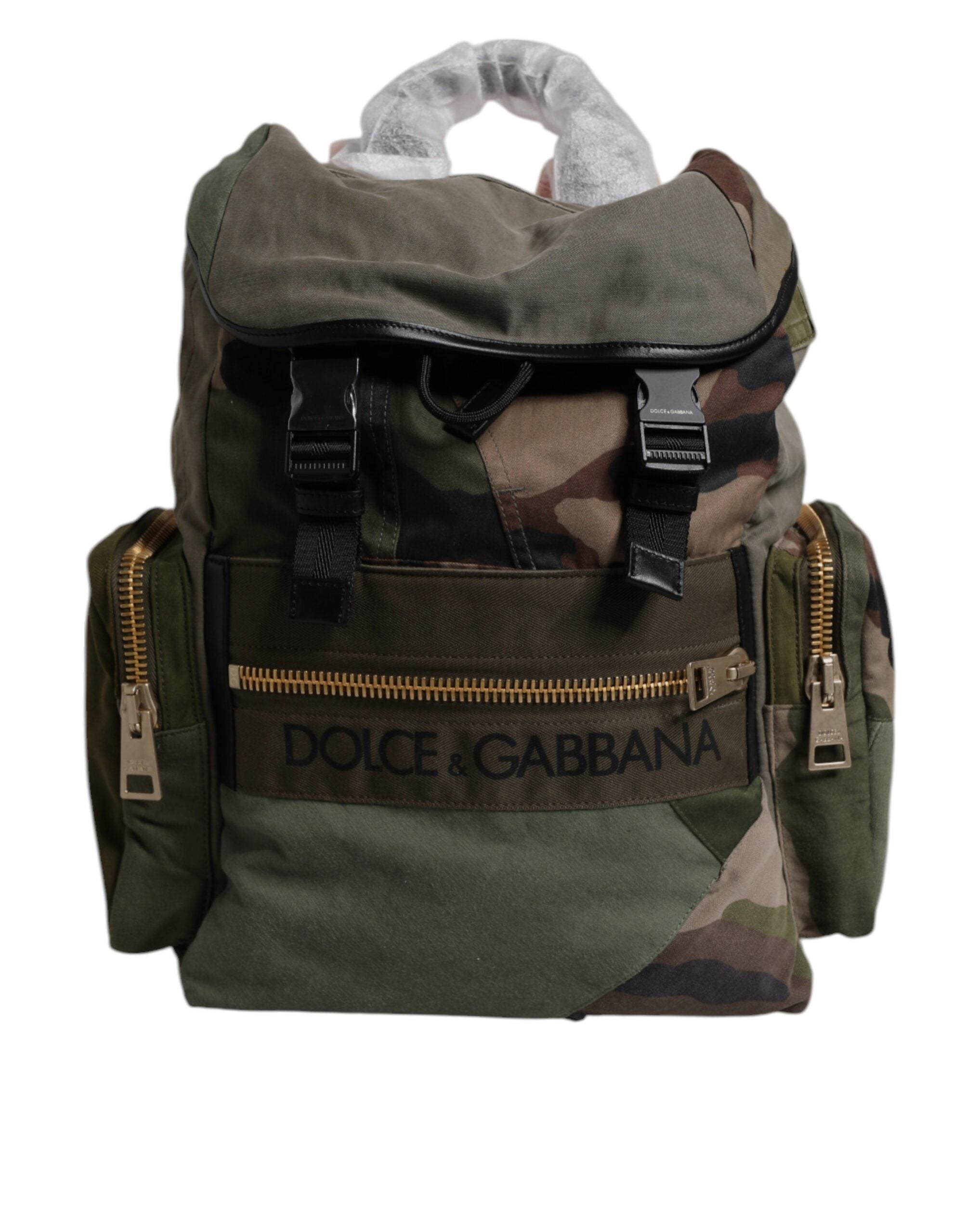 Sac à dos de voyage en patchwork vert militaire Dolce & Gabbana, avec détails en tissu et design robuste visible sur l'image.