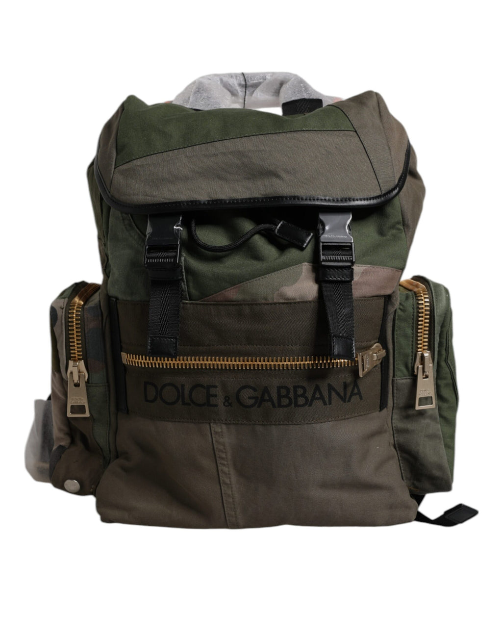 Sac à dos de voyage Dolce & Gabbana en vert militaire avec patchwork, poches zippées et bretelles réglables.