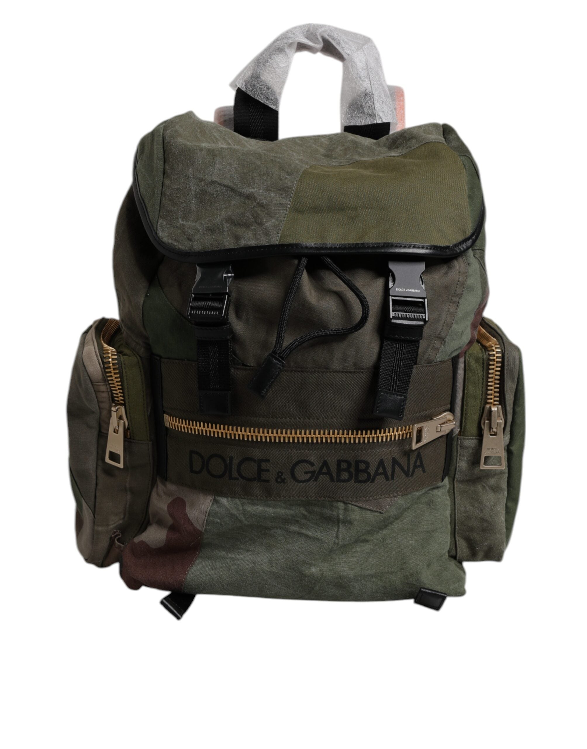 Sac à dos de voyage kaki militaire Dolce & Gabbana avec patchworks, pochettes zippées et détails en cuir.