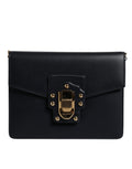 Sac à main Dolce & Gabbana en cuir de veau noir avec bandoulière, élégant et sophistiqué.