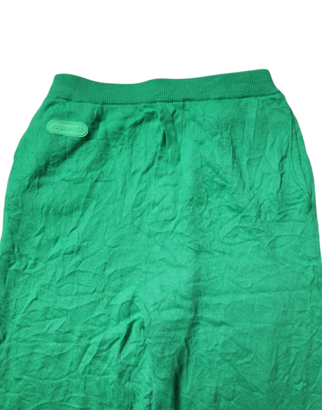 Pantalon homme décontracté en coton vert avec taille élastique de la marque Dsquared², vue en gros plan sur le tissu et la coupe.