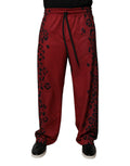 Pantalon jogger homme en polyester à imprimé léopard rouge de Dolce & Gabbana, vue de face.