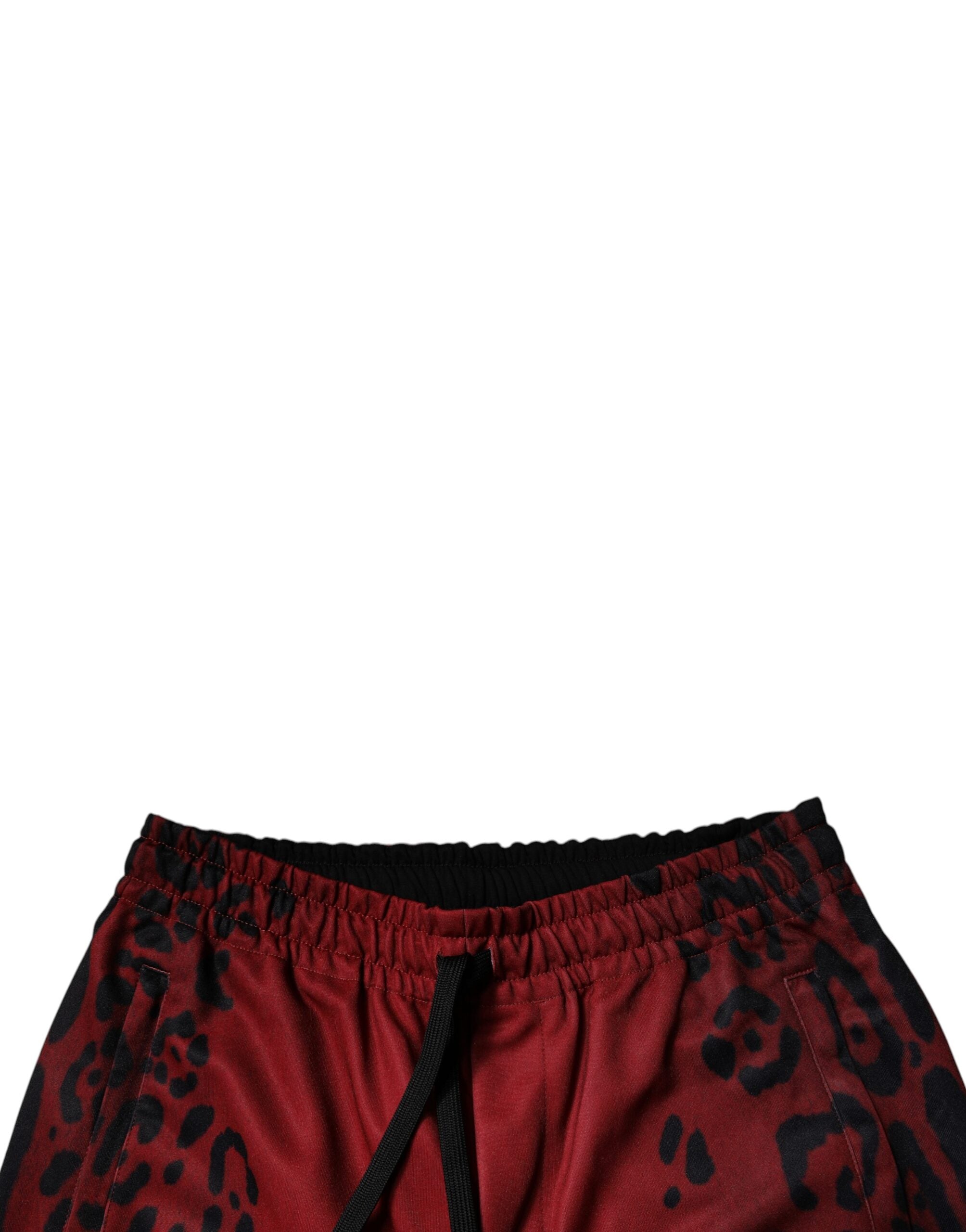 Pantalons jogger pour homme en polyester à imprimé léopard rouge de Dolce & Gabbana, style décontracté et tendance.