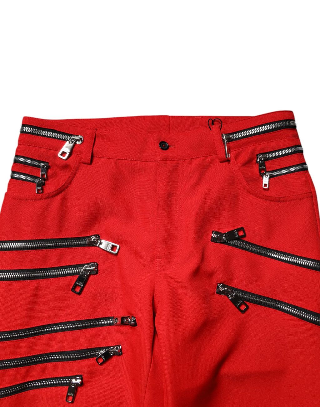 Pantalons droits rouges Dolce & Gabbana avec fermeture éclair ornée, style élégant et détails sophistiqués.