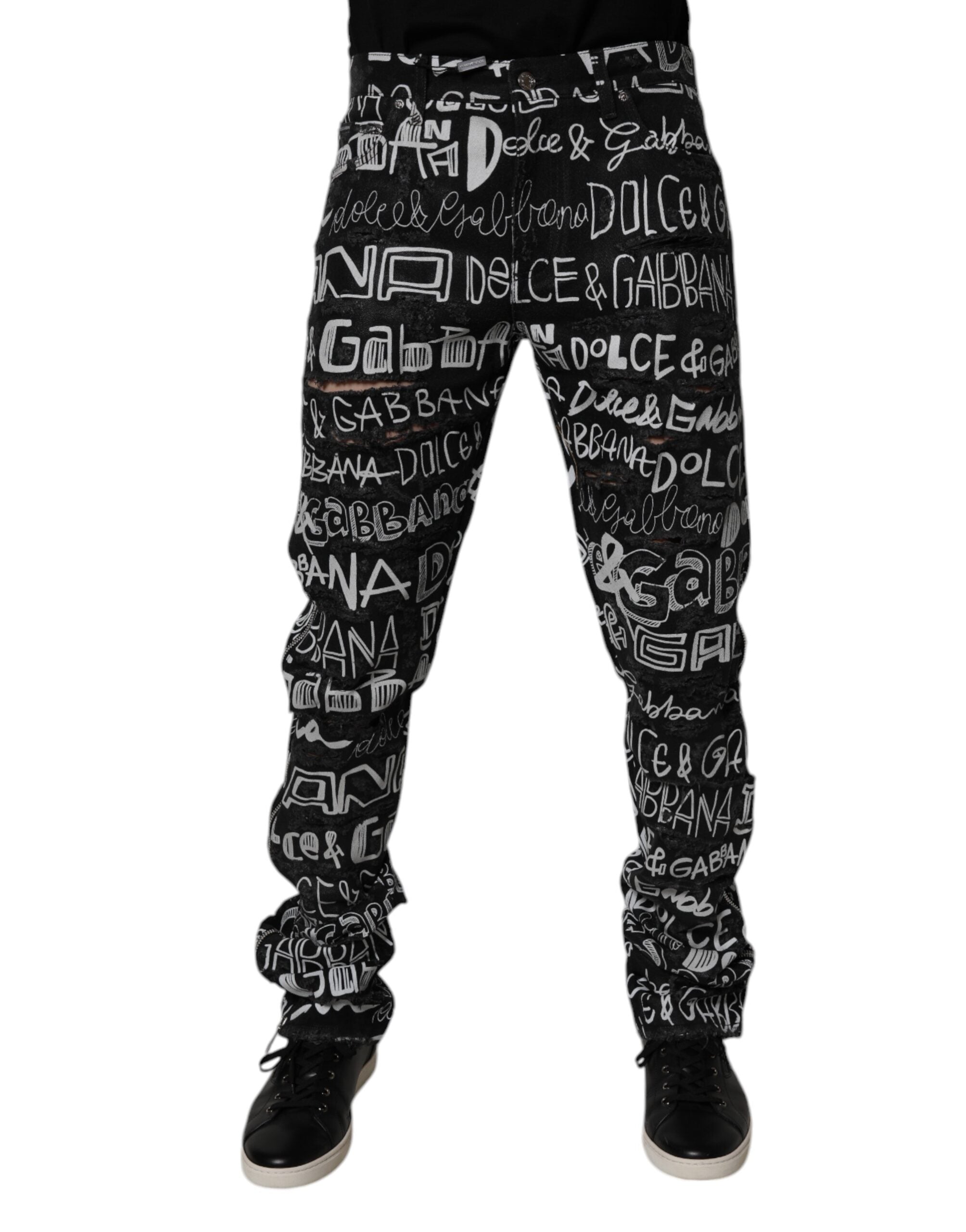 Jeans droits en denim noir Dolce & Gabbana avec logo imprimé en coton, visible en détail sur l'image.