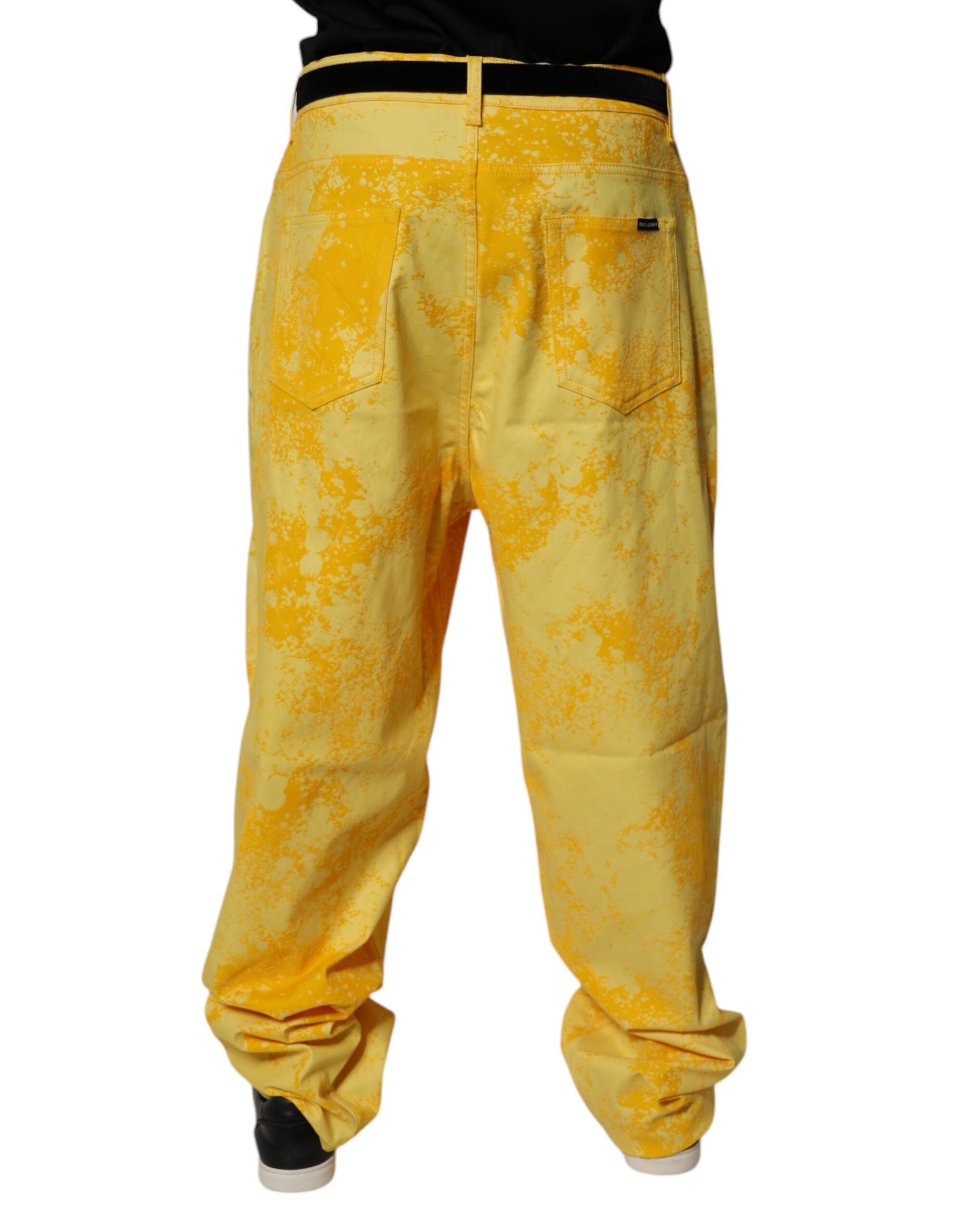 Jeans en denim droit jaune tie-dye en coton de Dolce & Gabbana, visible avec motif coloré et coupe classique.