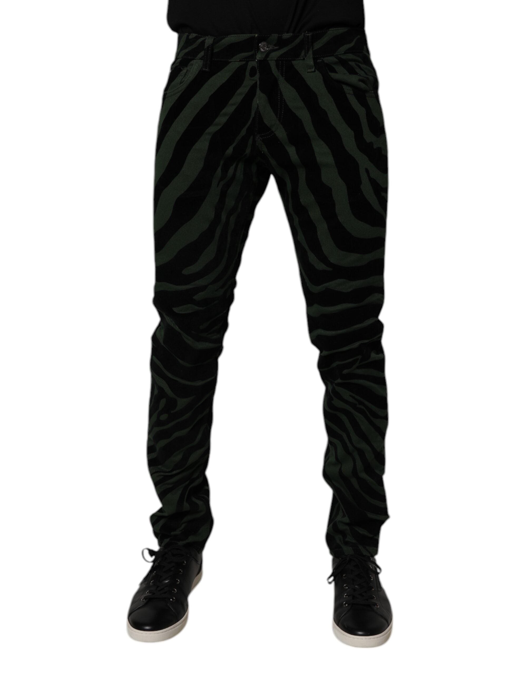 Jeans slim en denim coton noir et vert à rayures Dolce & Gabbana, coupe ajustée, détails visibles sur le produit.