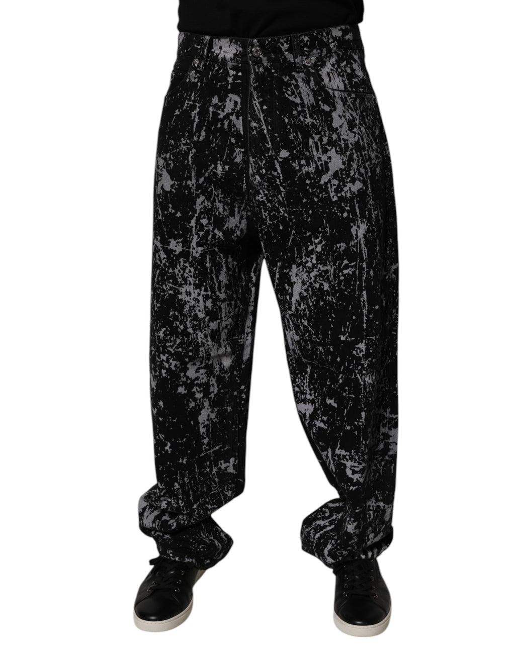 Jeans hommes Dolce & Gabbana en coton noire avec effet tie-dye, coupe droite et style décontracté.