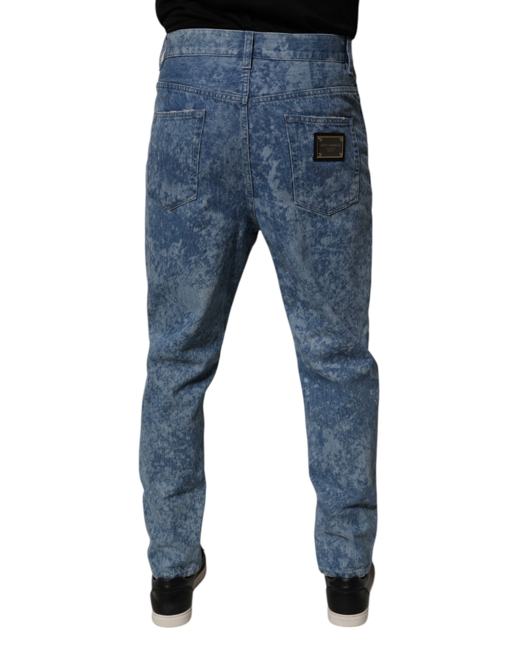 Jeans homme skinny en coton tie-dye bleu de Dolce & Gabbana, denim avec ceinture et détails tendance.
