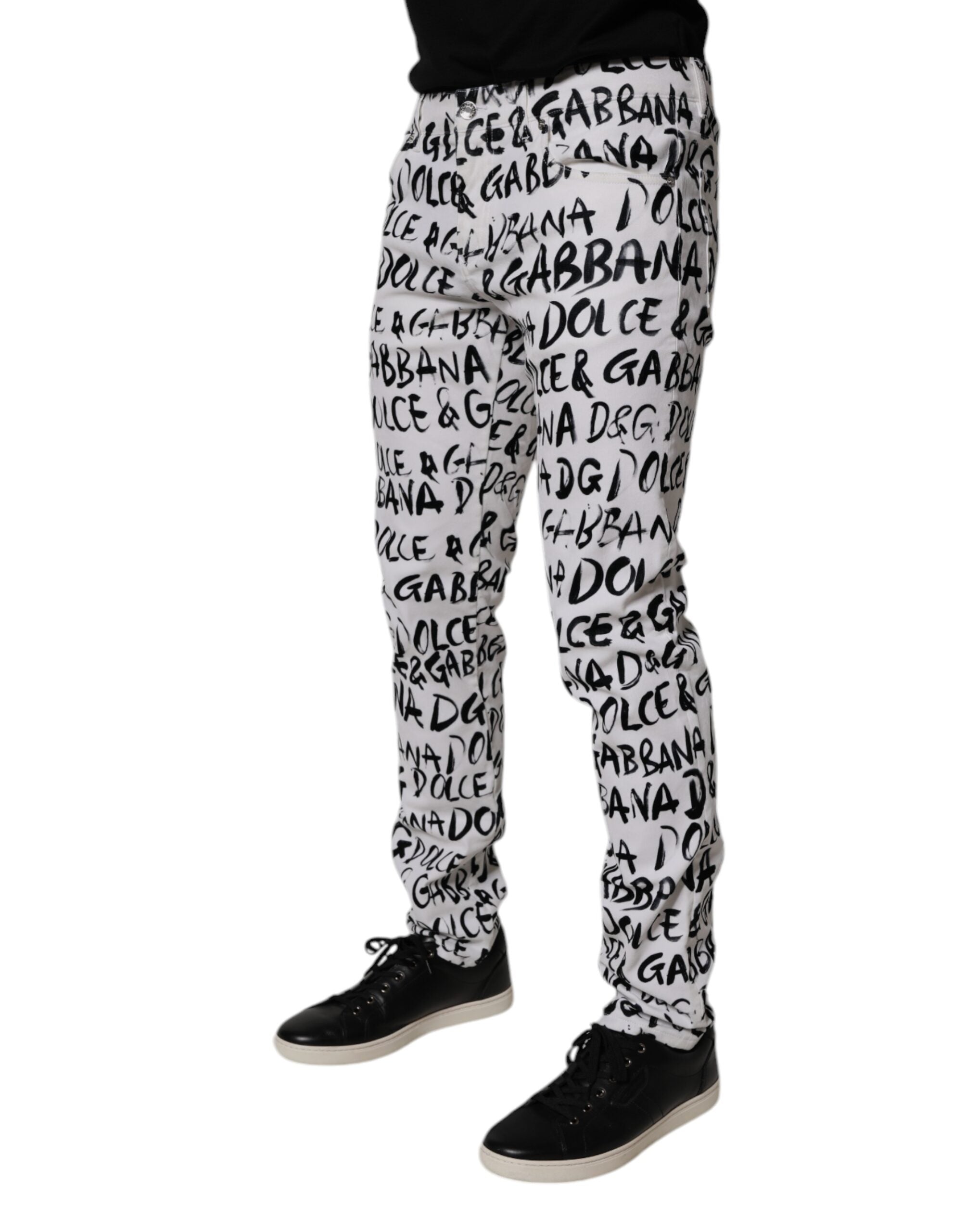 Jeans skinny en coton blanc Dolce & Gabbana avec logo imprimé, visibles détails et coupe ajustée en denim.