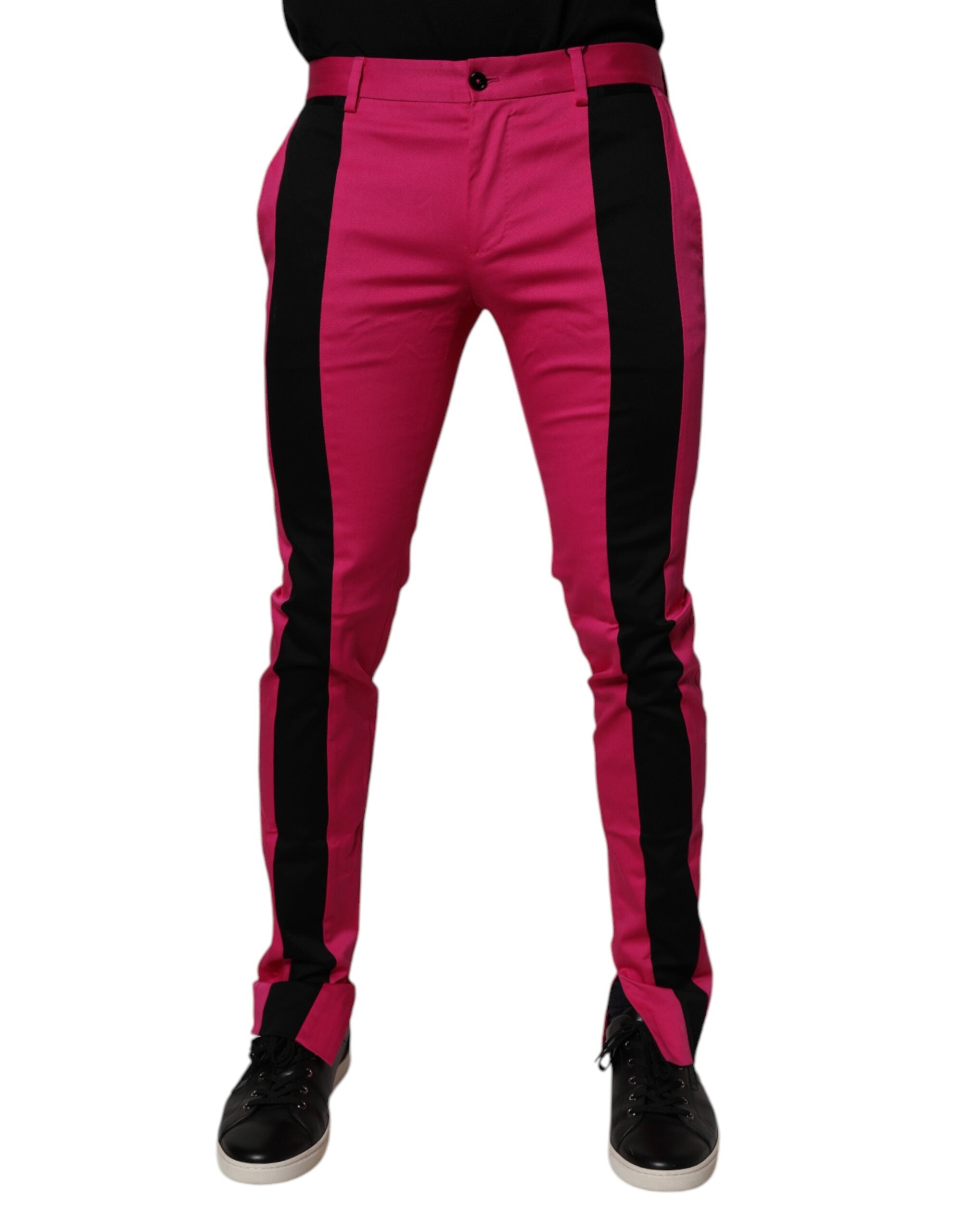 Pantalon homme Dolce & Gabbana à rayures roses et noires, coupe slim, style élégant et ajusté.