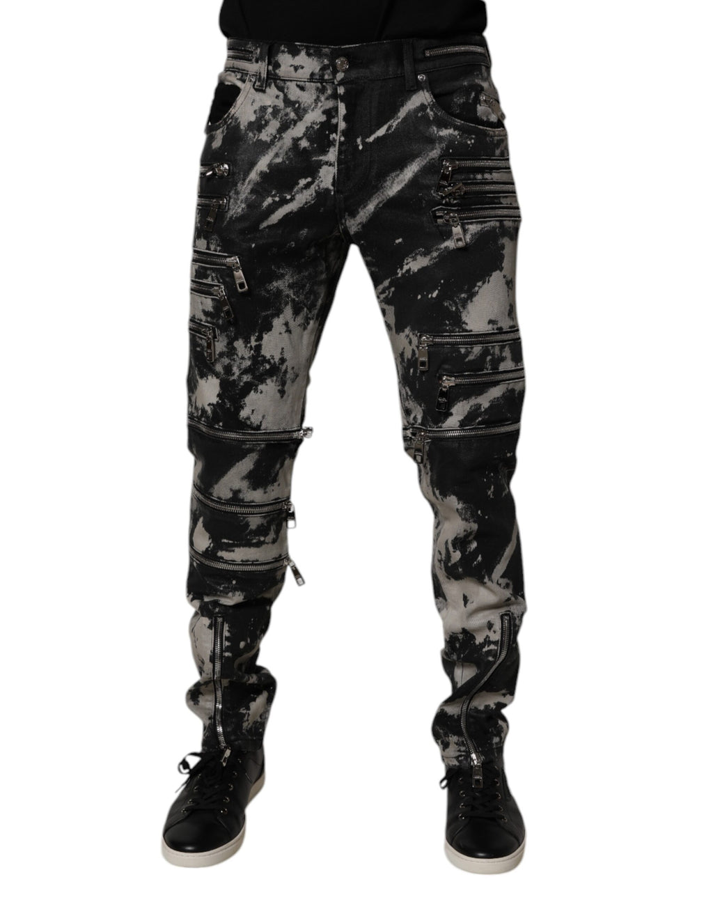 Jeans skinny en denim coton à teinture tie-dye noire de Dolce & Gabbana, avec fermeture éclair.