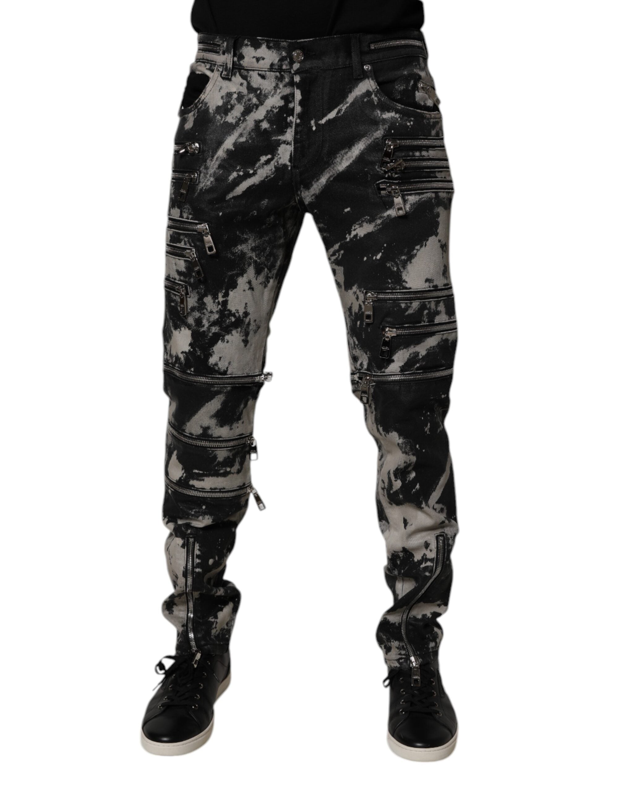 Jeans skinny en denim noir à tache de teinture, fermeture éclair, de la marque Dolce & Gabbana, style mode urbaine