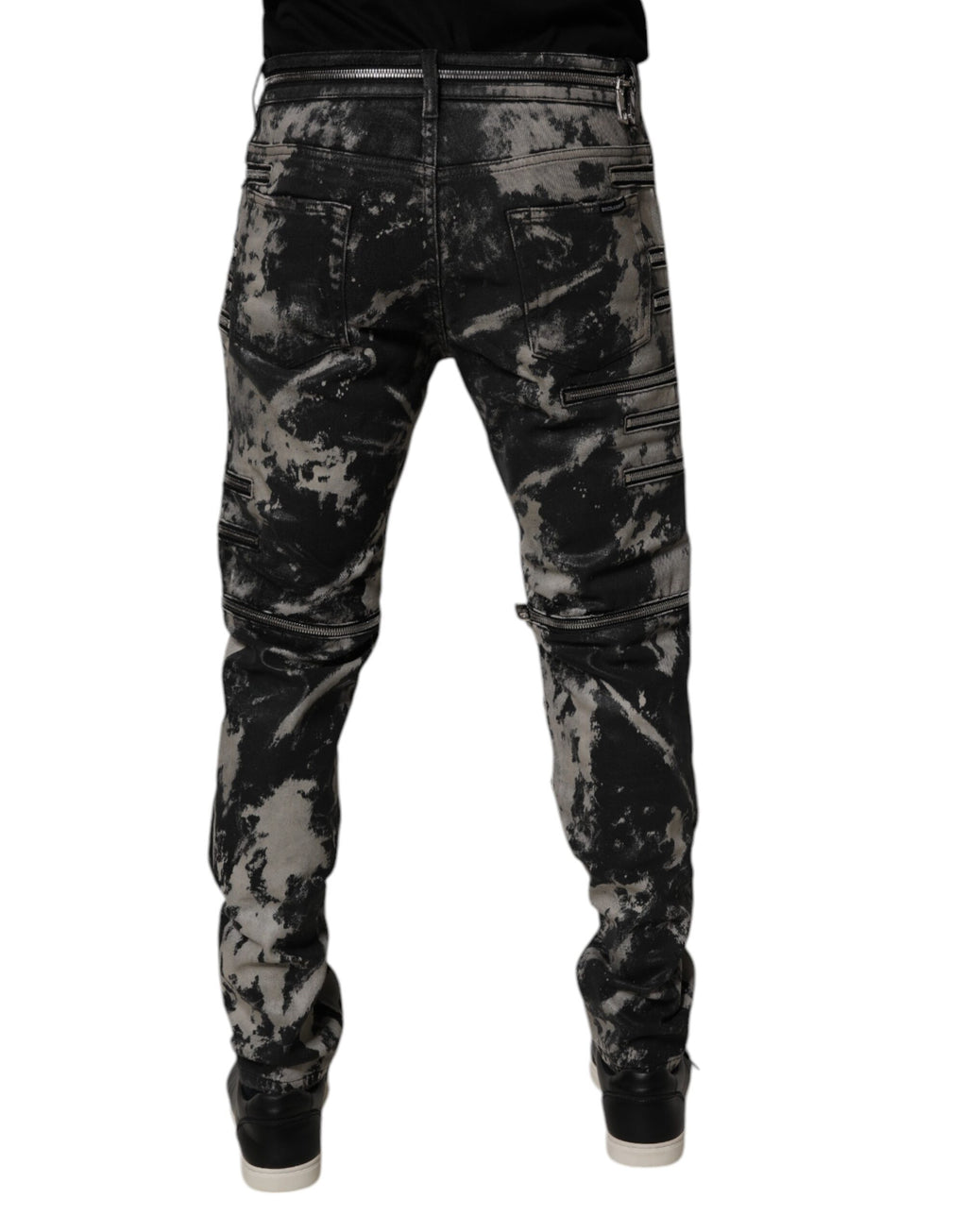 Jeans slim en denim noir tie-dye en coton de Dolce & Gabbana avec fermeture éclair et taille ajustée.