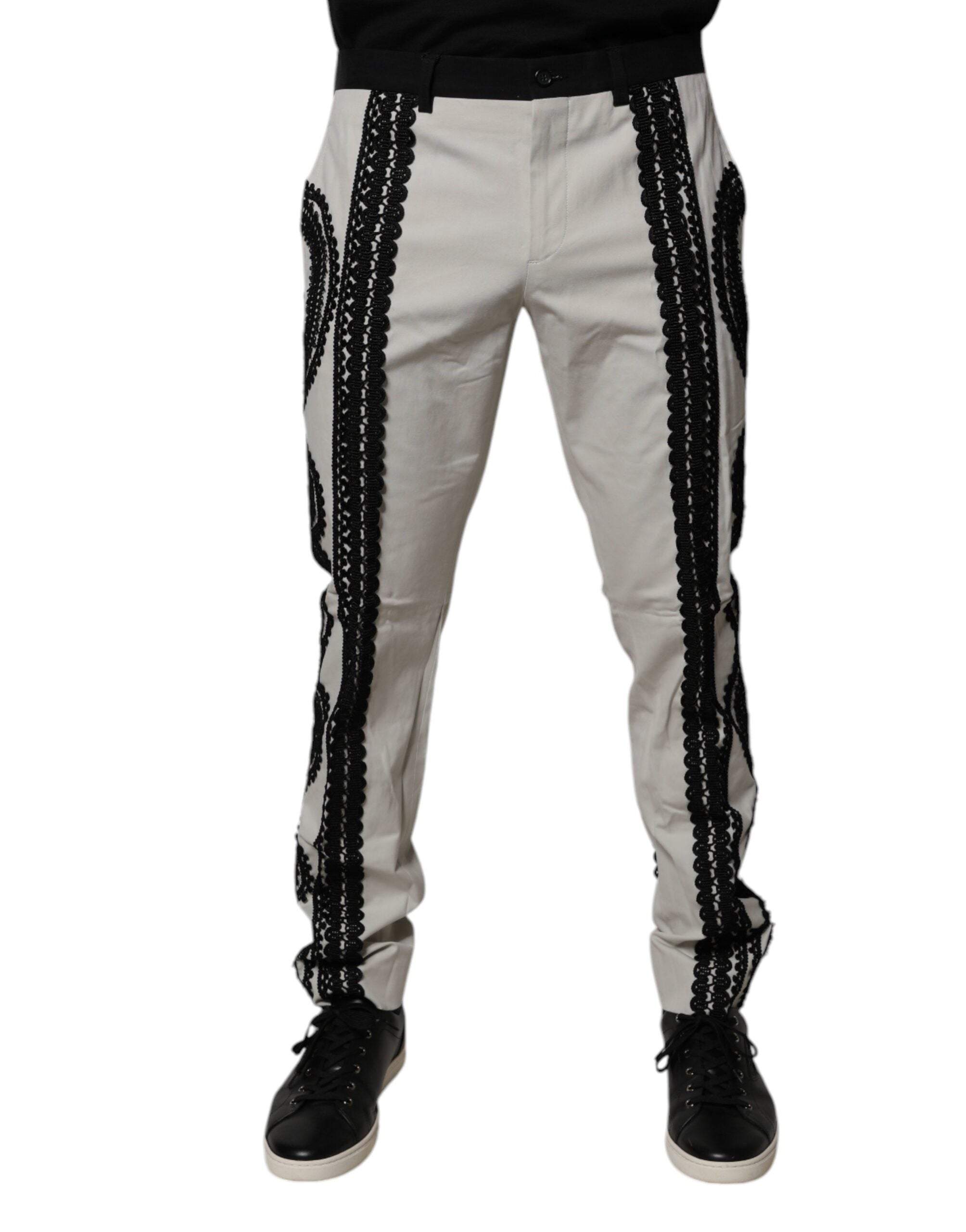 Pantalon formel blanc avec broderie en dentelle Dolce & Gabbana, taille moyenne, design élégant et sophistiqué.