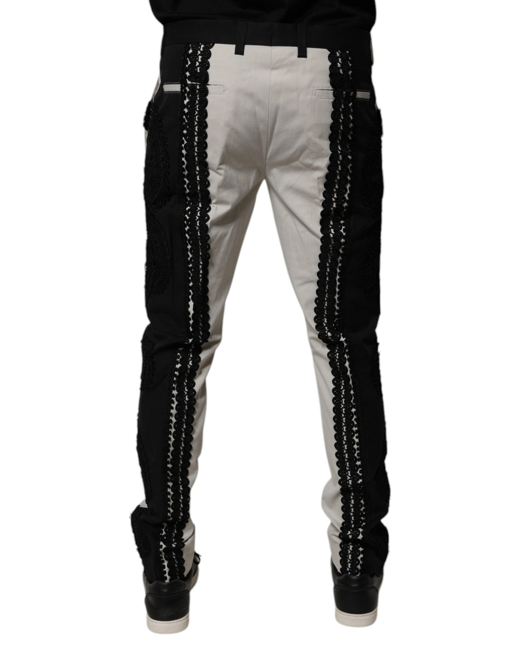 Pantalon formel Dolce & Gabbana blanc en dentelle, taille mi-hauteur, avec détail de couture élégante.
