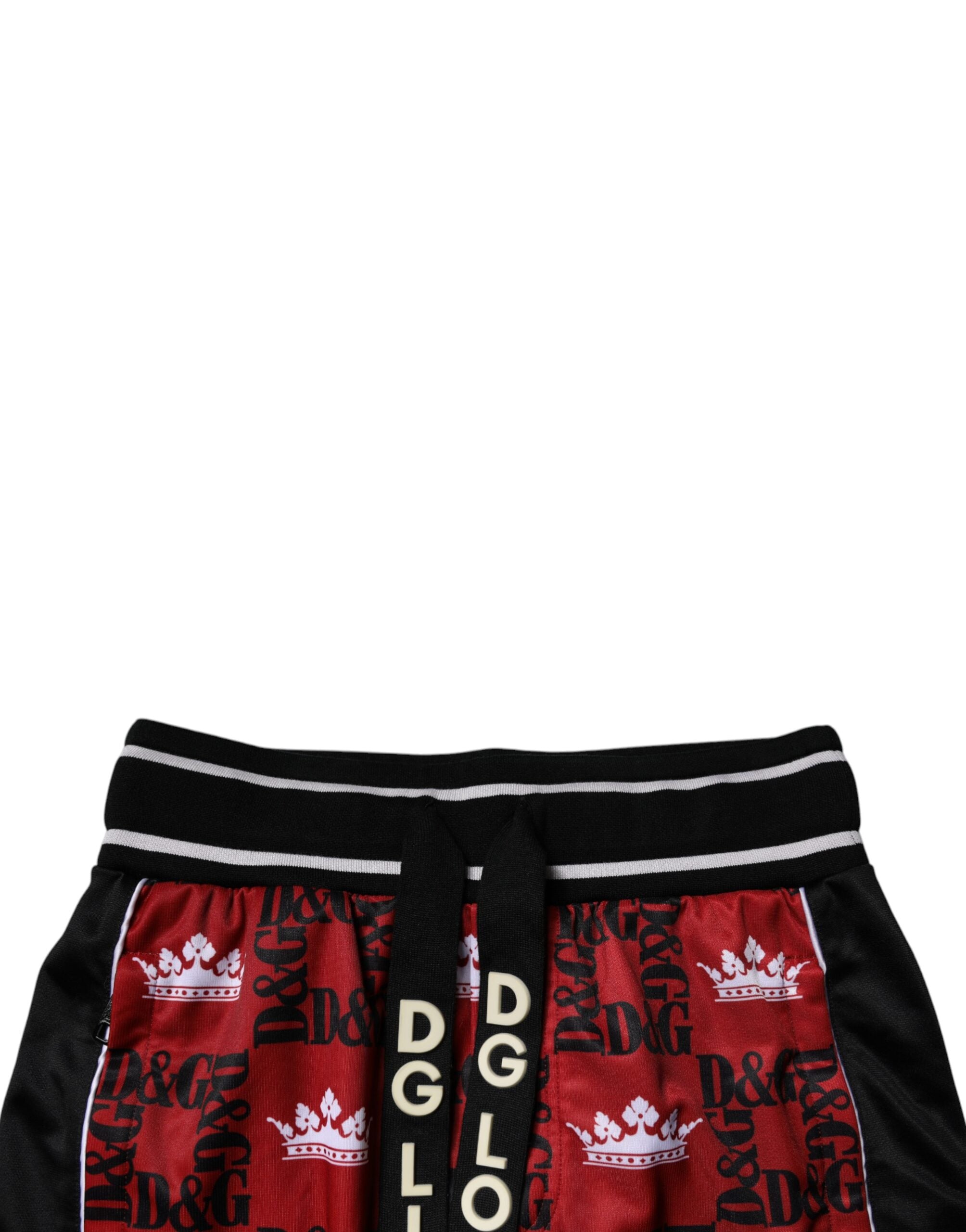 Pantalon de survêtement rouge Dolce & Gabbana avec logo couronne et monogramme pour homme, tissu confortable et design élégant.