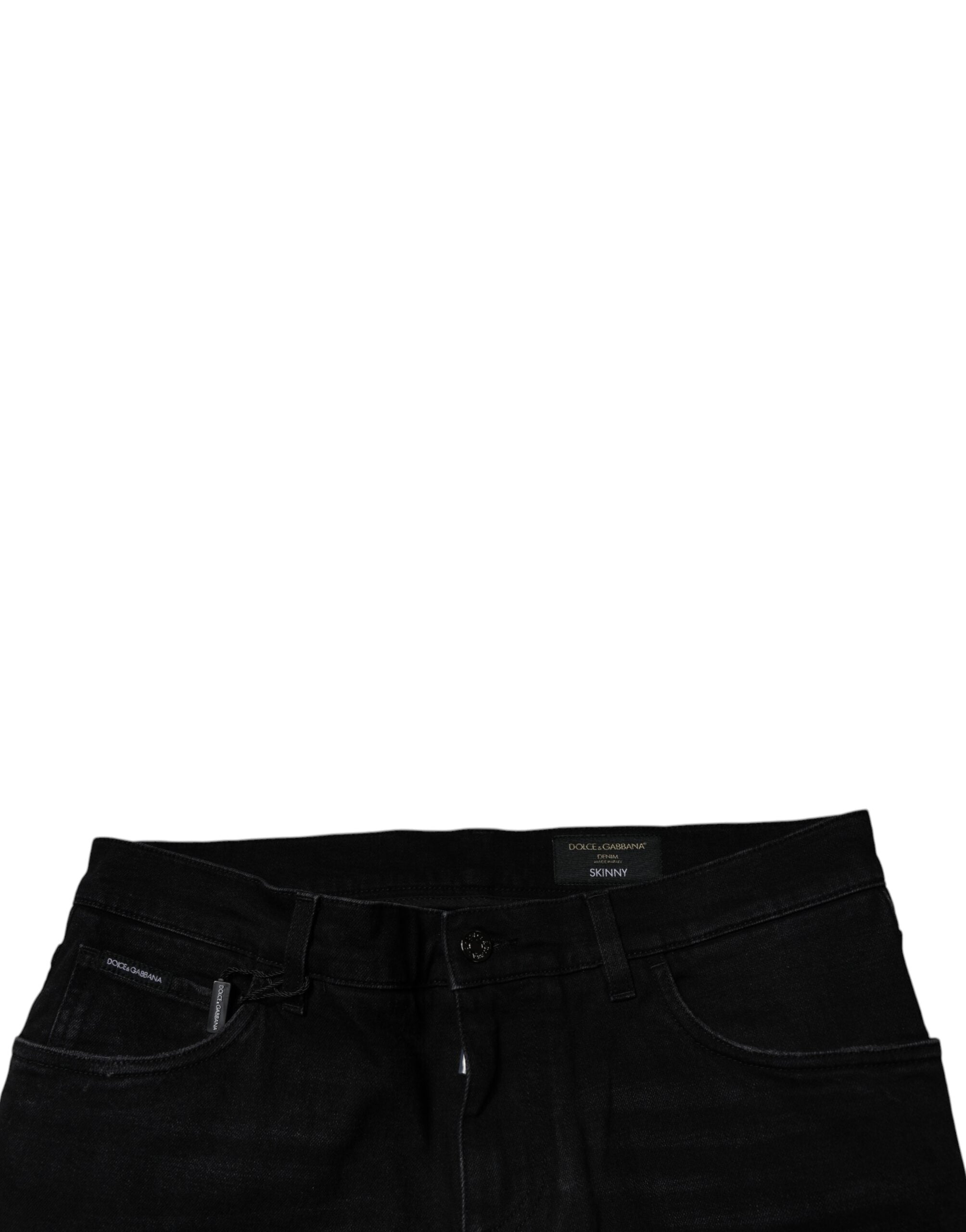 Jeans homme skinny en denim noir déchiré de Dolce & Gabbana, coupe ajustée en coton.